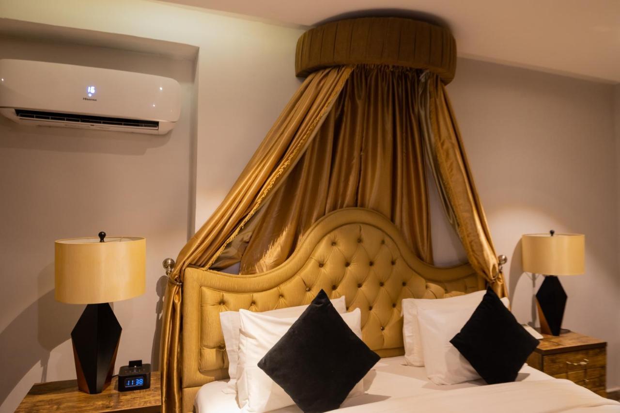 Villa Monument Hotel Aliayabiagba Bagian luar foto