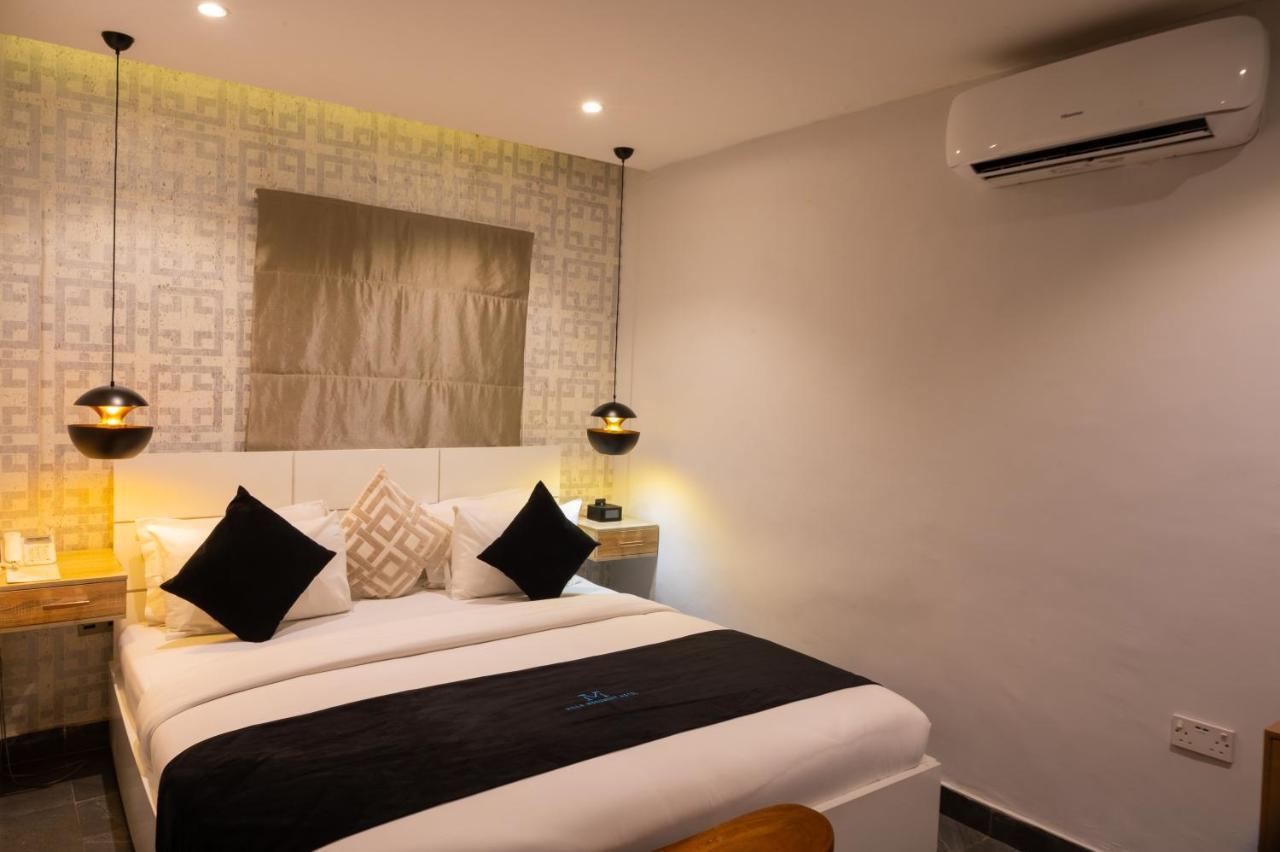 Villa Monument Hotel Aliayabiagba Bagian luar foto