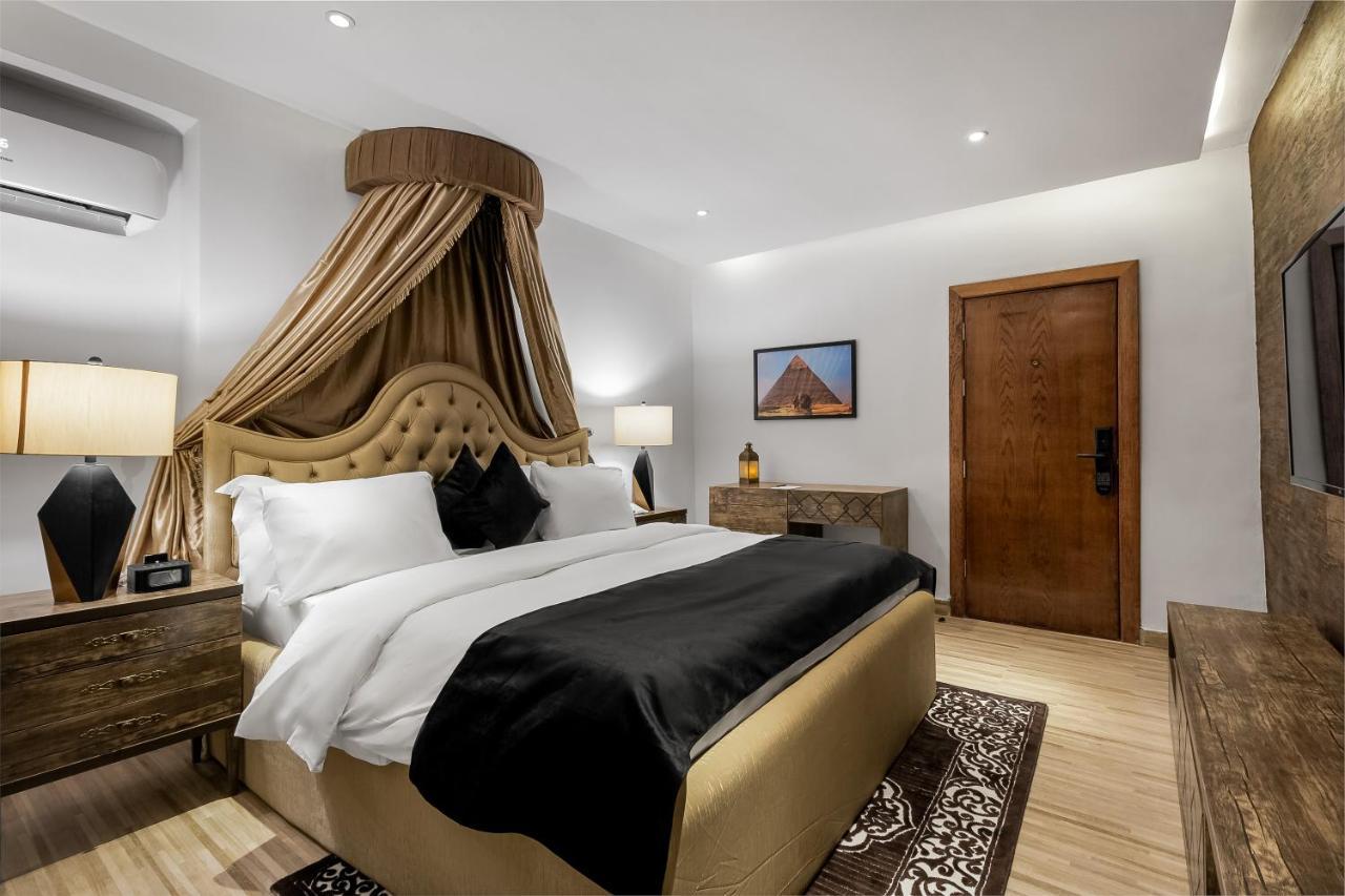 Villa Monument Hotel Aliayabiagba Bagian luar foto